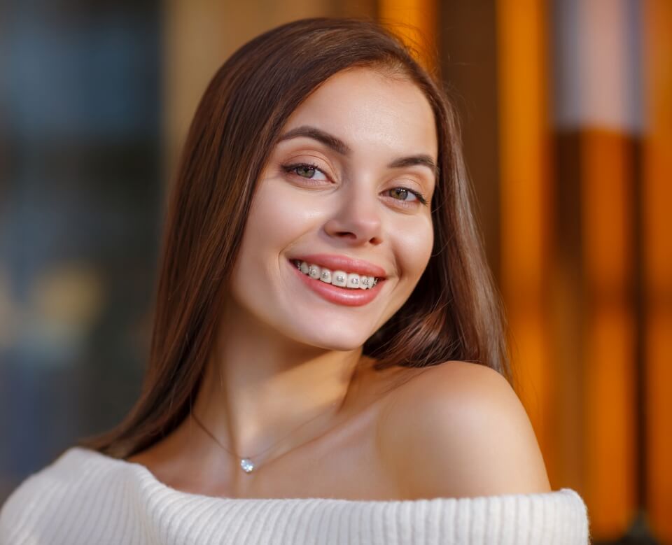 Smiling woman with orthodontics