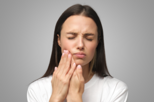 a patient suffering from jaw pain 